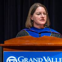 faculty addressing audience